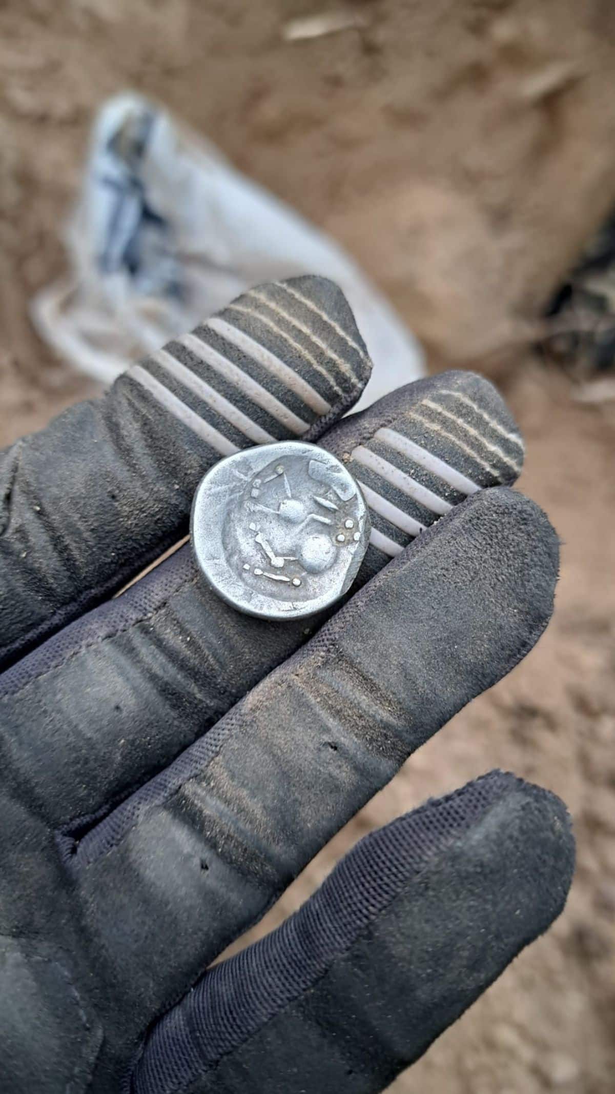 Single daco celtic coin close up.